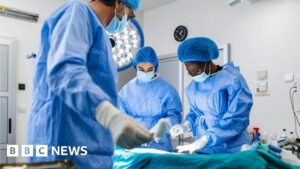NHS waiting list in England rises to record 7.7m